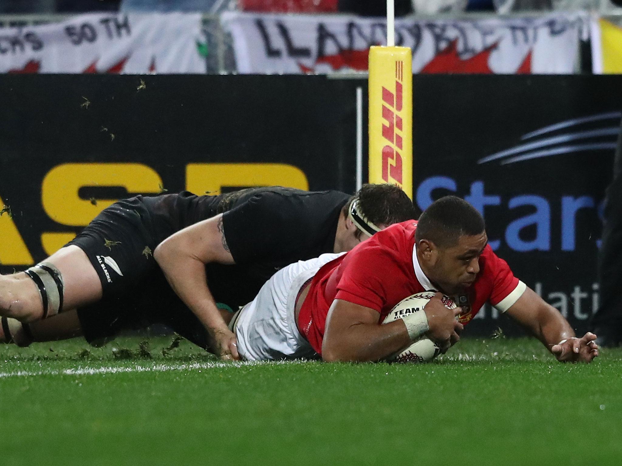 Taulupe Faletau crashes over for the Lions' first try
