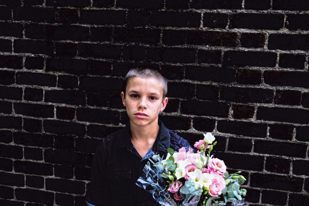 &#13;
'Didn’t plan this photo - Romeo and I were waiting to see our little sister’s ballet recital and we bought her flowers. I took this when we were waiting outside and I love it.' &#13;