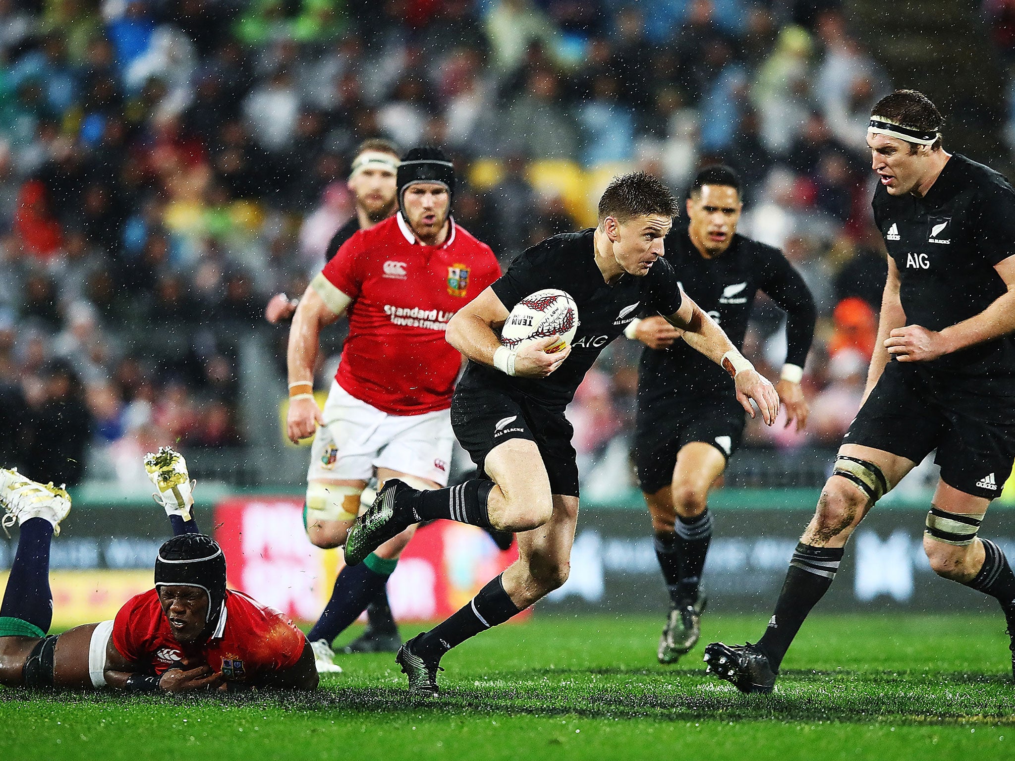 Beauden Barrett breaks free of a tackle