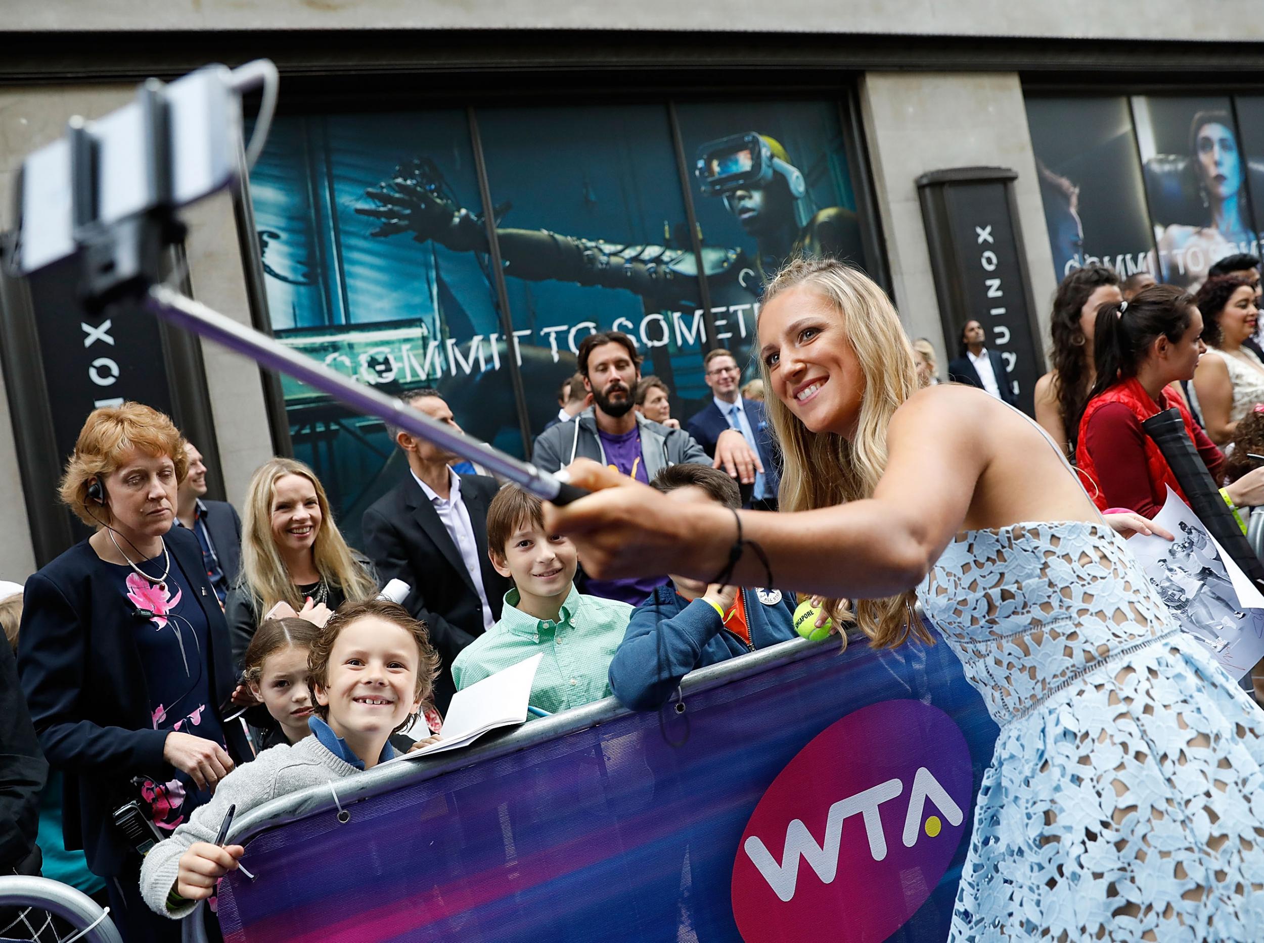 &#13;
Azarenka with fans at the WTA's pre-Wimbledon party &#13;