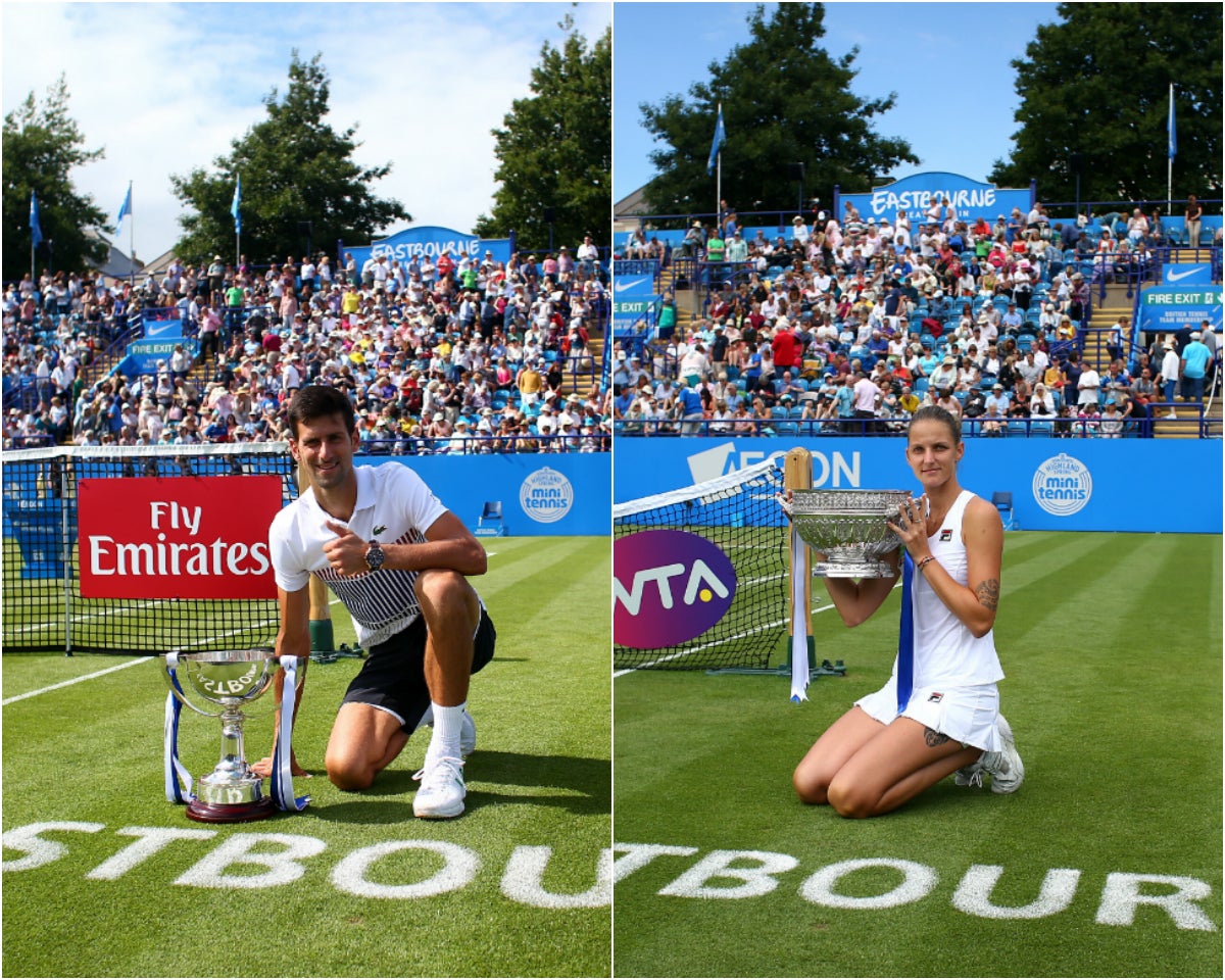 The two singles champions pose with their trophies