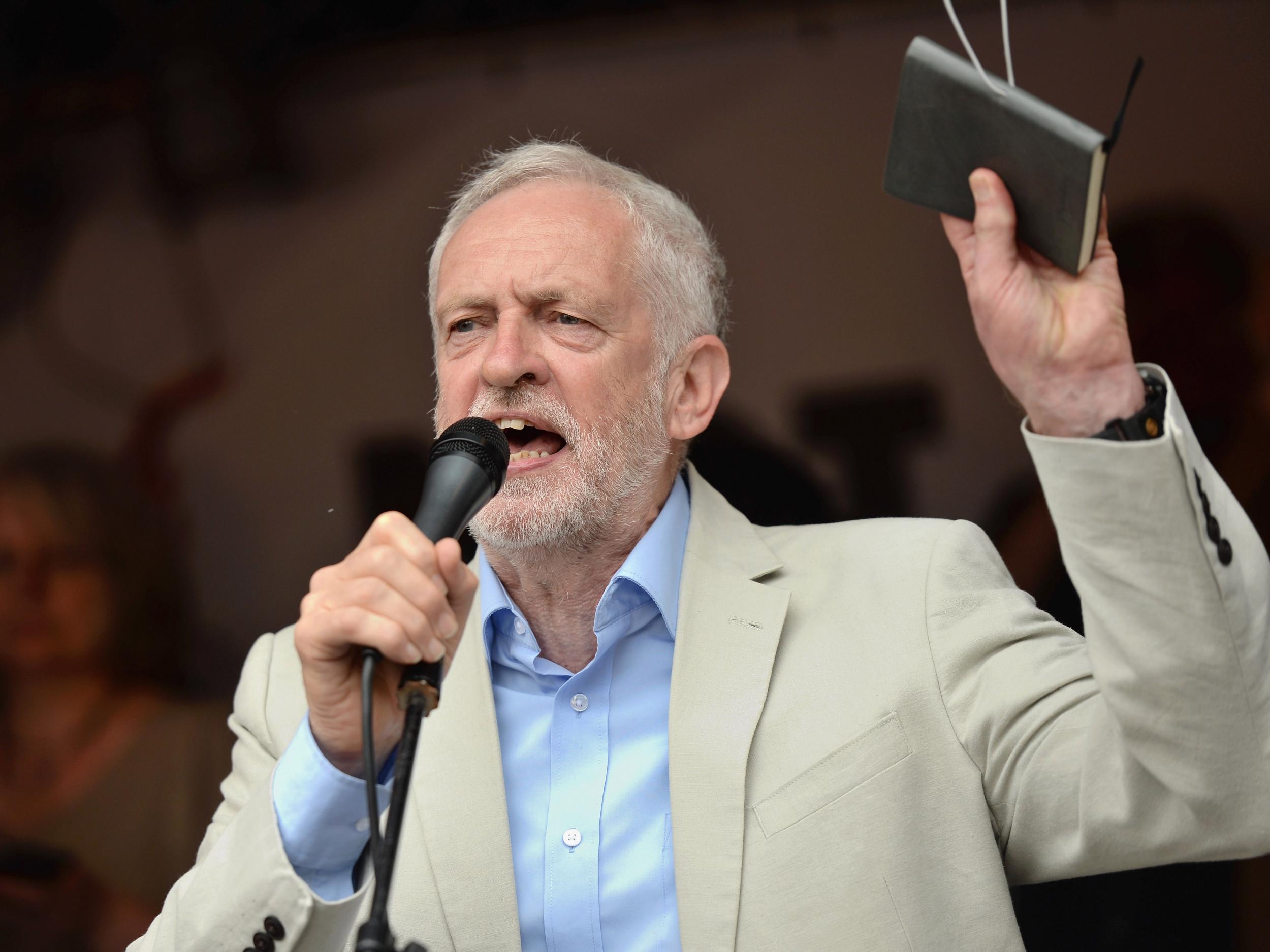 Jeremy Corbyn speaks at an anti-austerity march at Parliament Square