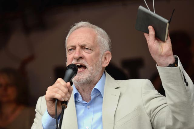 Jeremy Corbyn speaks at an anti-austerity march at Parliament Square