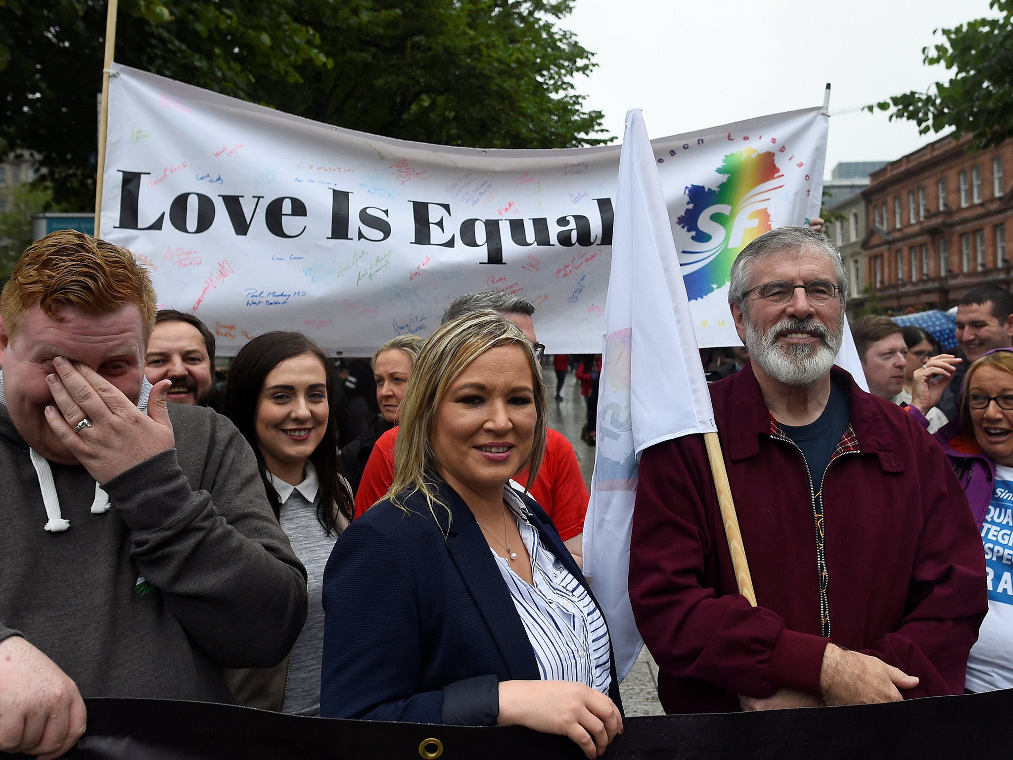 Sinn Fein President, Gerry Adams, and the leader of Sinn Fein in Northern Ireland, Michelle O'Neill, join marriage equality demonstrators in Belfast