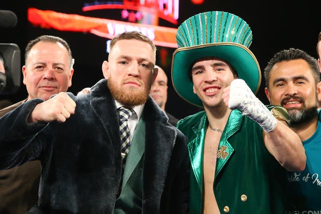 Conor McGregor accompanied Michael Conlan during the walk-on to his professional debut