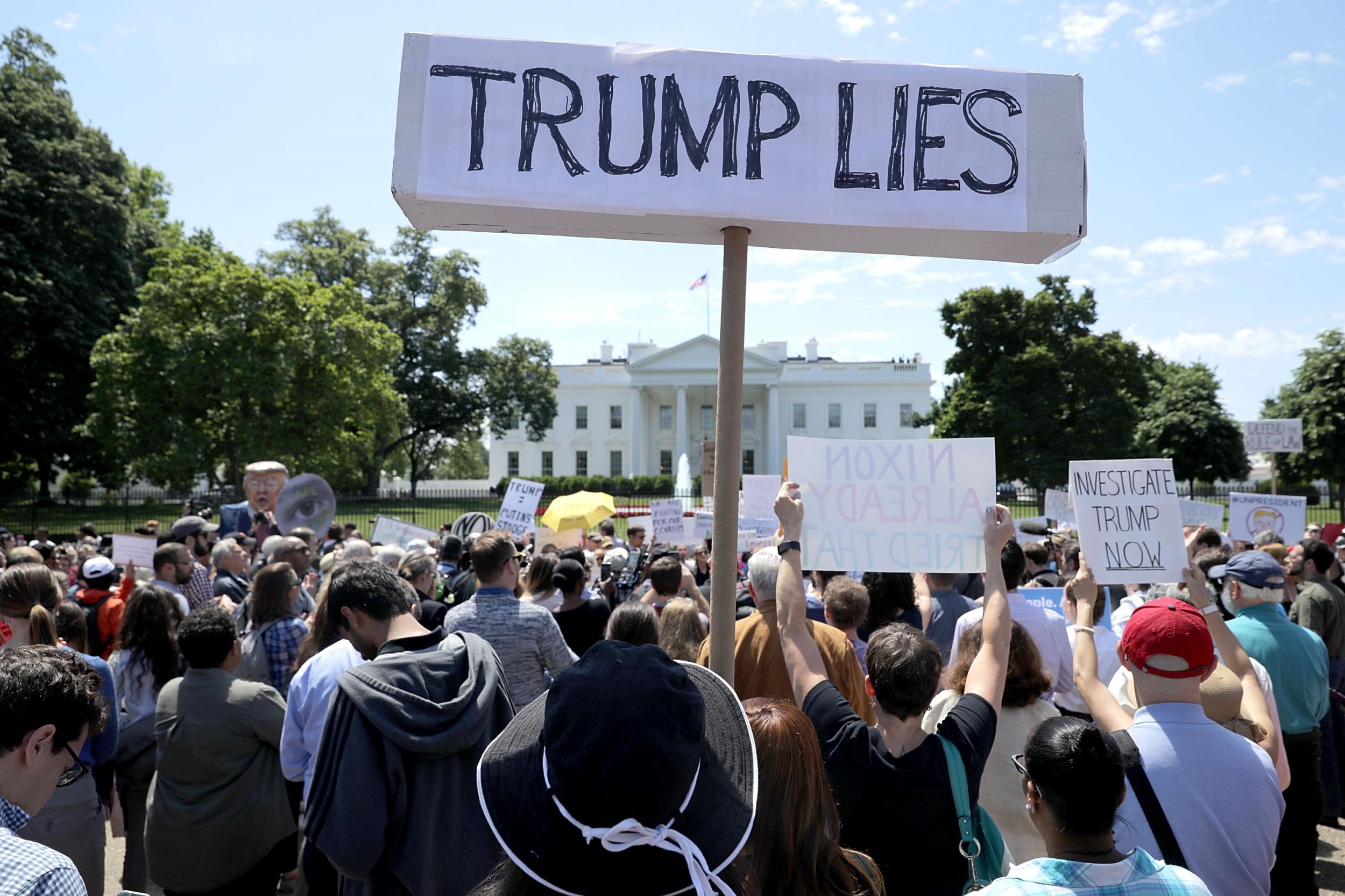 People protest outside the White House