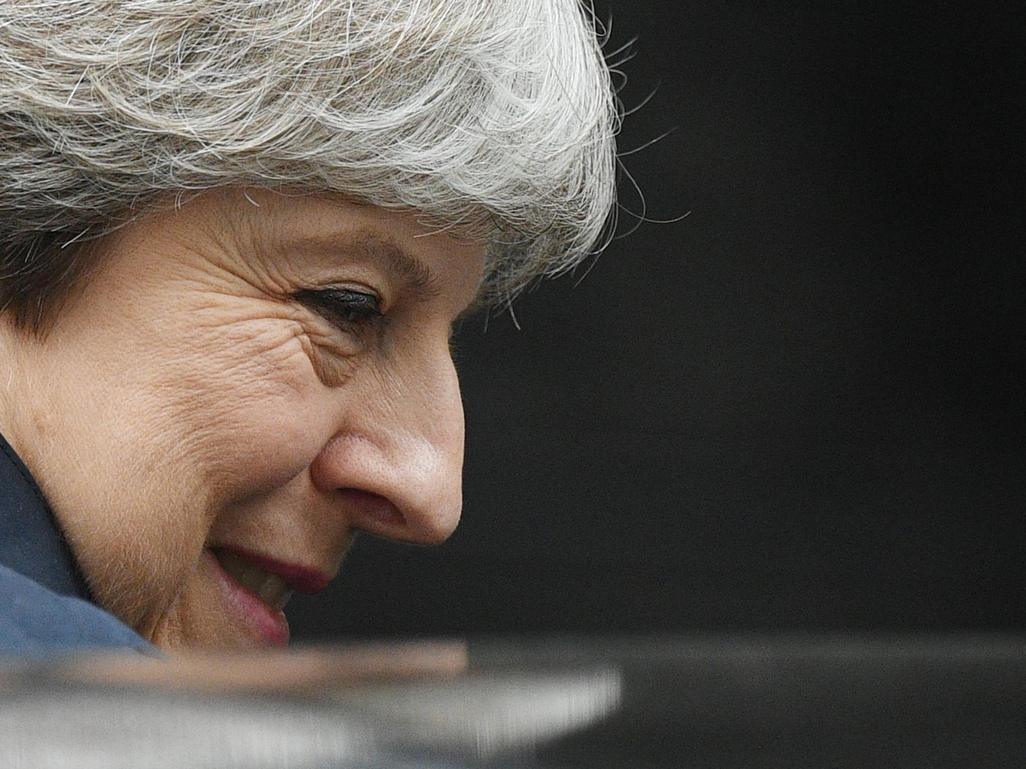 Theresa May is under mounting pressure to ease austerity