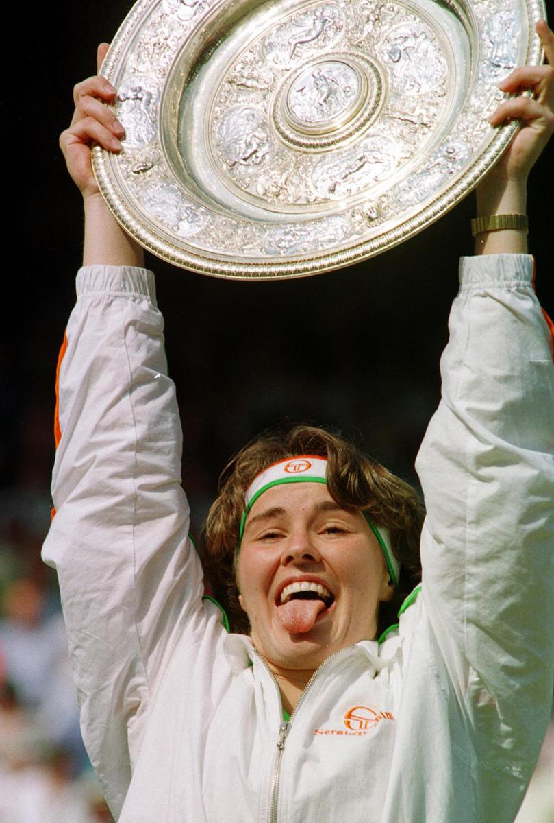 &#13;
Former singles champions Martina Hingis (shown here in 1997) boasts 12 doubles titles at grand slams &#13;