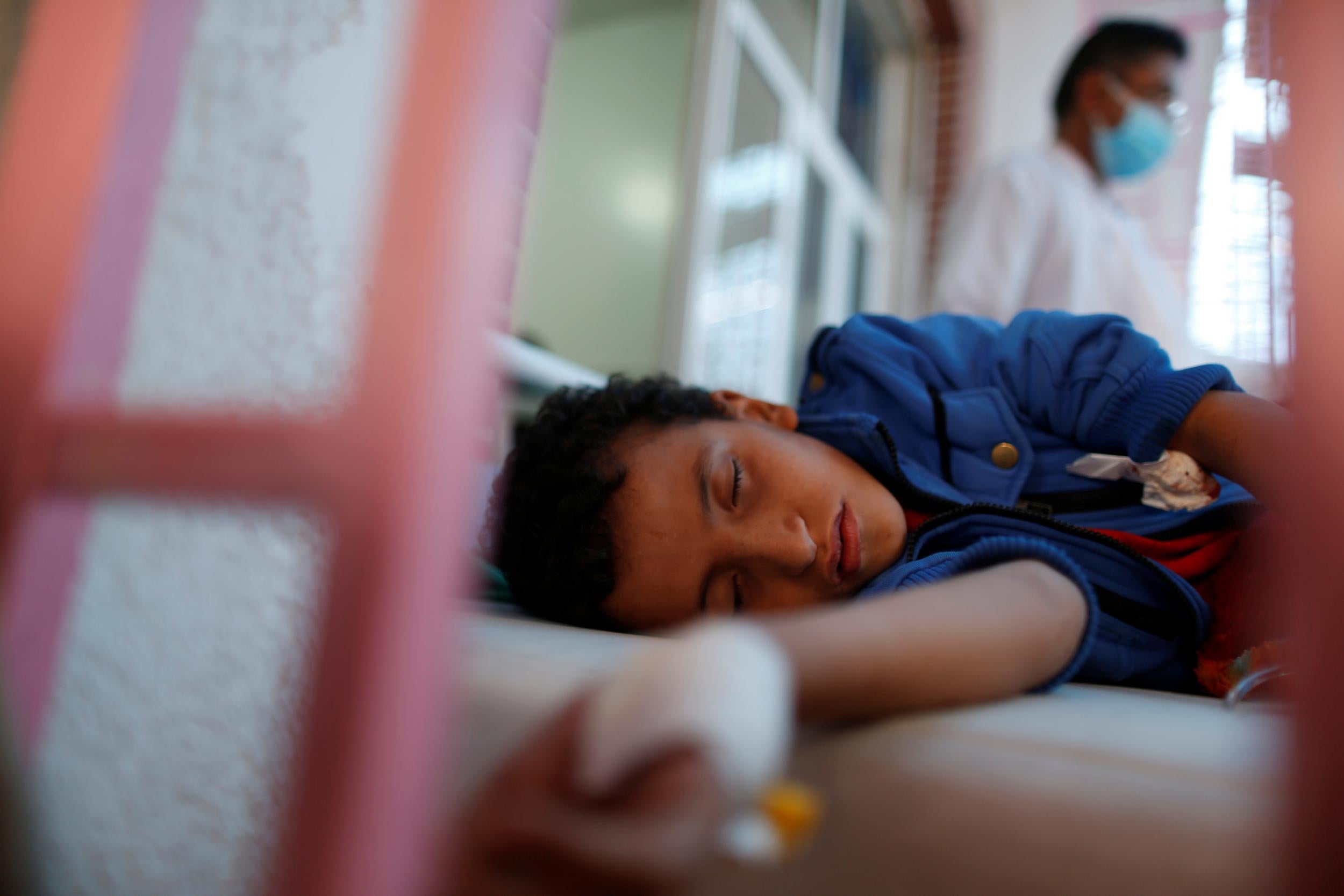 A sick boy rests at a cholera treatment centre in Sanaa, Yemen on 15 May 2017