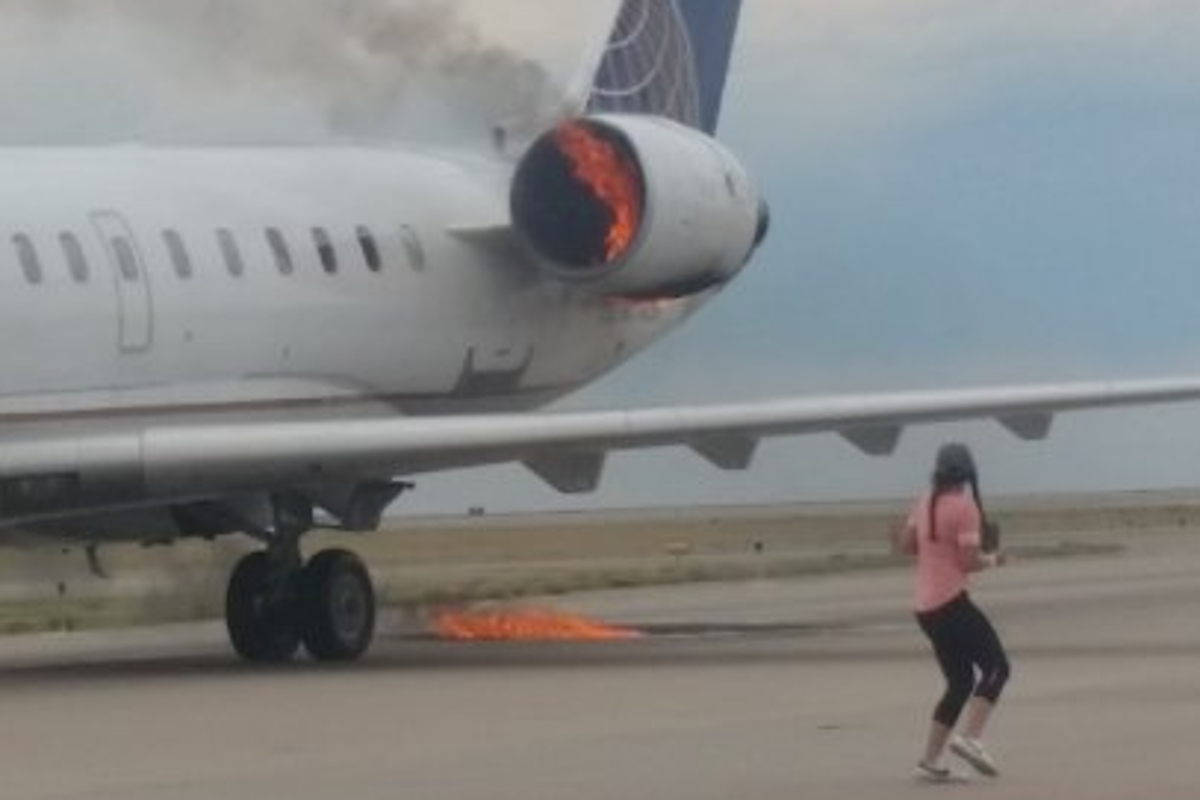 United Airlines plane catches fire on runway after landing at Denver