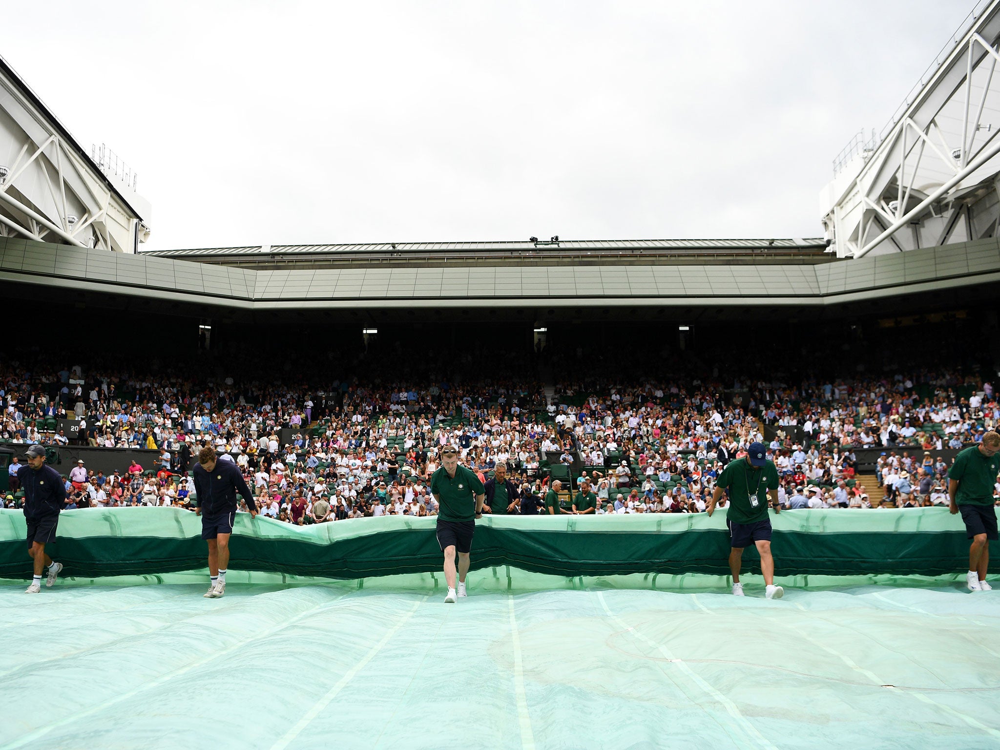 Murray's game was briefly delayed by rain