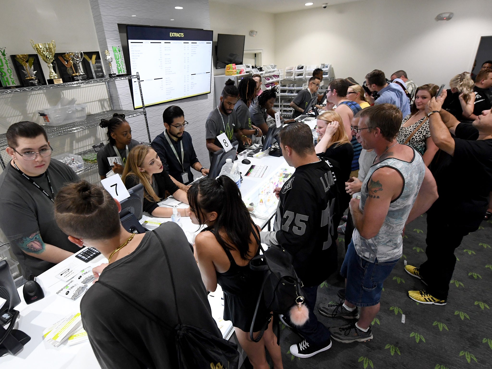 Customers buy cannabis products at Essence Vegas Cannabis Dispensary after the start of recreational marijuana sales