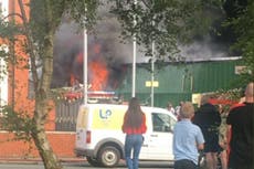 'Two missing' after major fire at paintballing centre in St Helens
