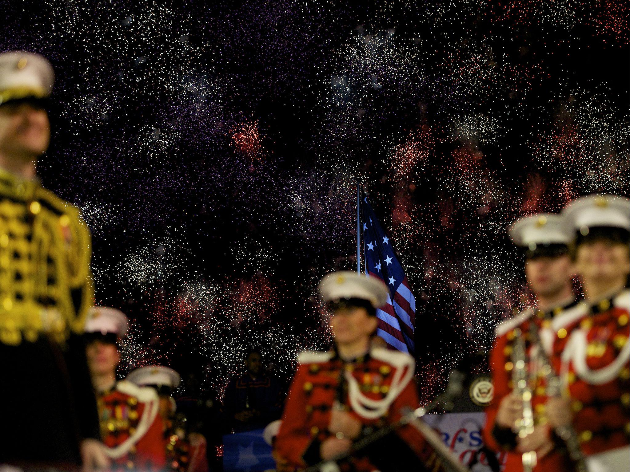 Members of the President's Own Marine Band stand during a fireworks display commemorating the bicentennial of the writing of The Star-Spangled Banner at Fort McHenry National Historic Park on September 13, 2014 in Baltimore, Maryland.