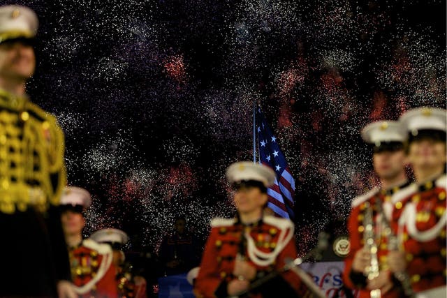 Members of the President's Own Marine Band stand during a fireworks display commemorating the bicentennial of the writing of The Star-Spangled Banner at Fort McHenry National Historic Park on September 13, 2014 in Baltimore, Maryland.