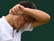 Tomic sneers at critics after 'feeling bored' in first round defeat