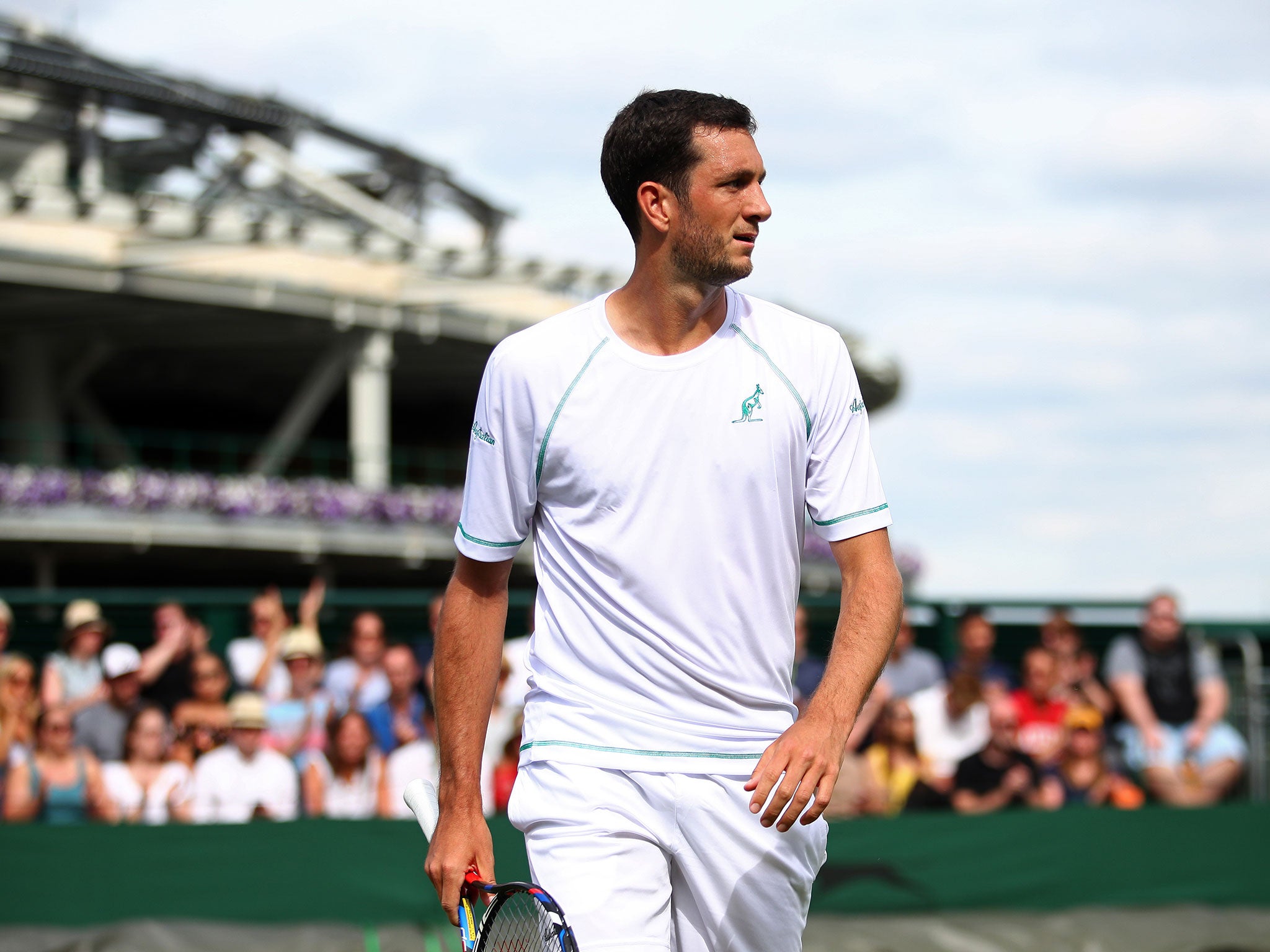 James Ward was beaten in straight sets by Marcos Baghdatis