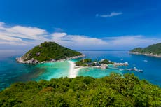 Tens of thousands escape Thai tourist islands as 7m waves forecast
