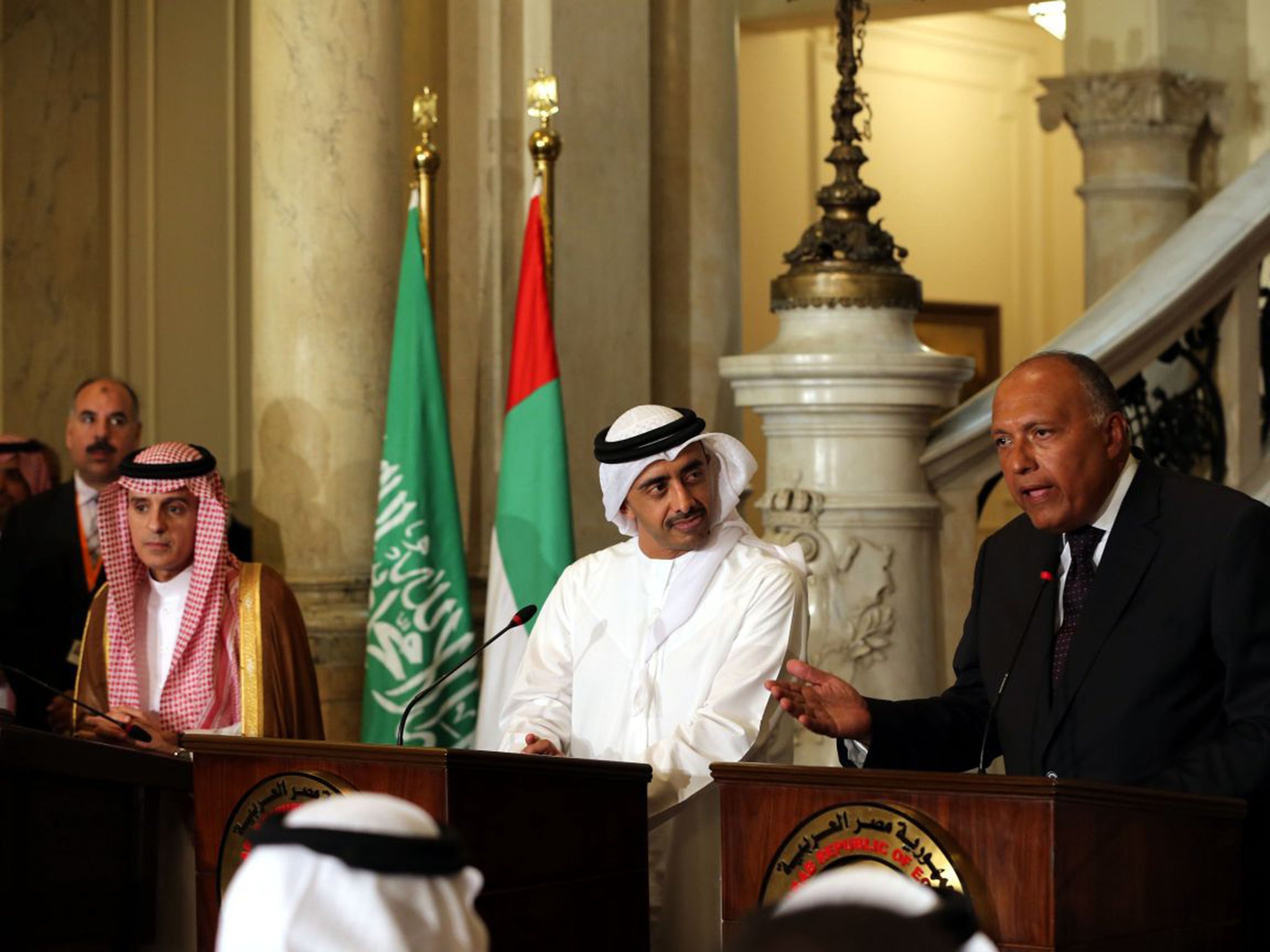 Egyptian Foreign Minister Sameh Shoukry (right) in a joint press conference with UAE Minister of Foreign Affairs Abdullah bin Zayed Al-Nahyan (C) and Saudi Foreign Minister Adel al-Jubeir, in Cairo