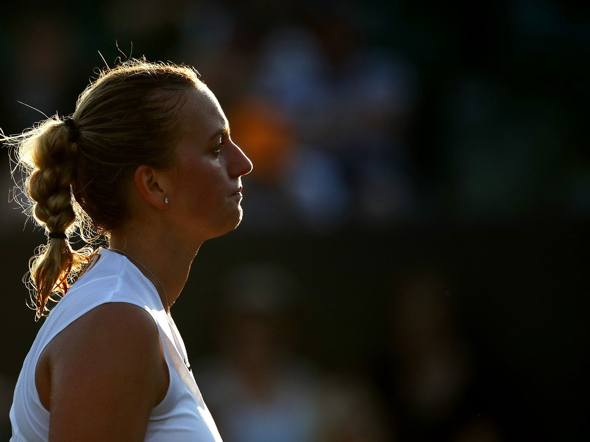 Petra Kvitova looks on after defeat