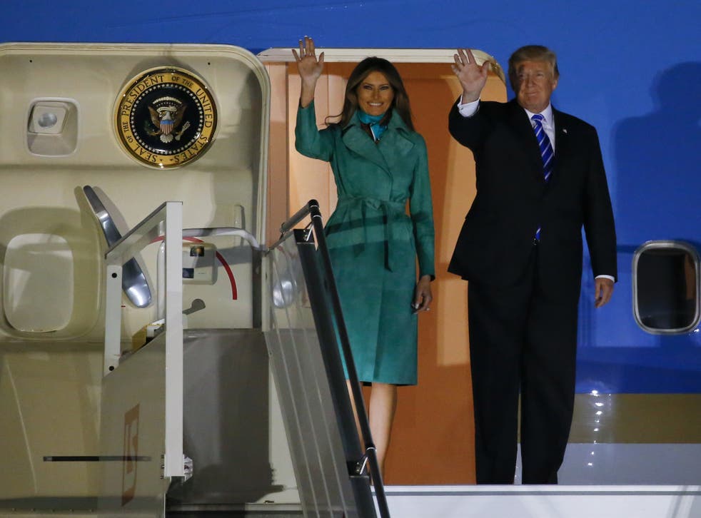 US President Donald Trump and First Lady Melania Trump arrive at Warsaw military airport in Poland