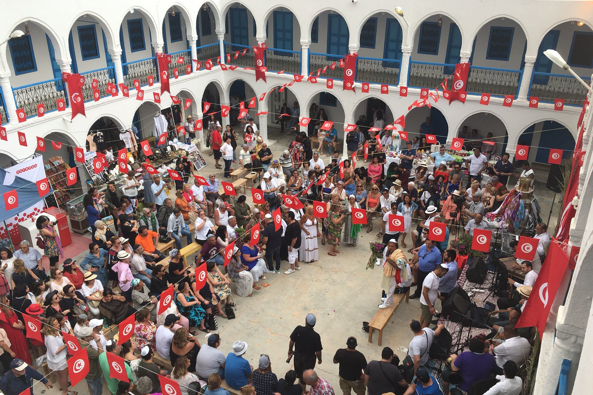 Ghriba Synagogue is decorated with red Tunisian flags