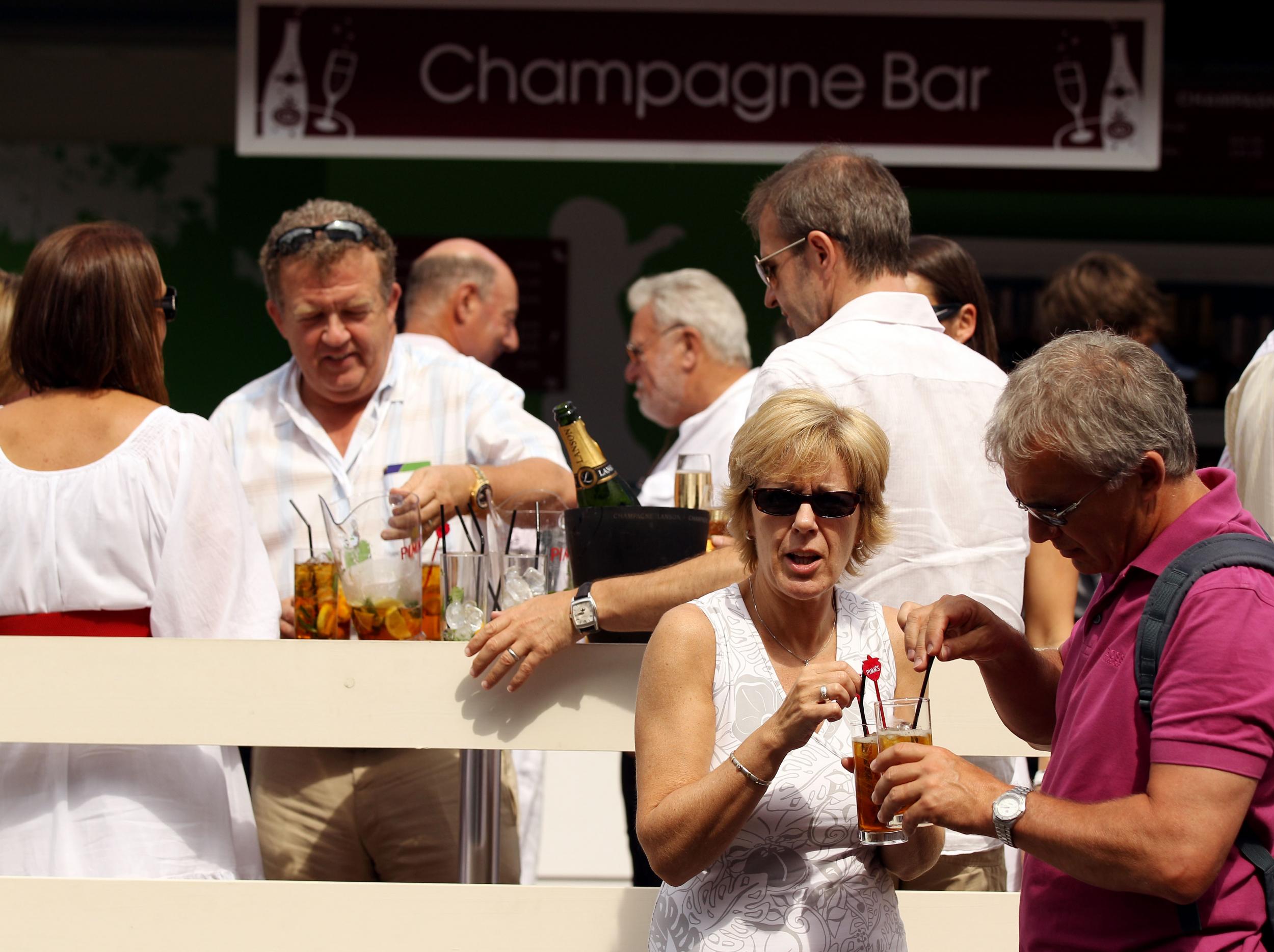 The champagne tents are always busier than the courts (Getty )