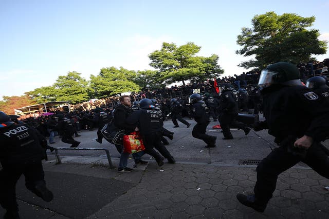 German riot police try to stop protesters during the demonstrations during the G20 summit in Hamburg,