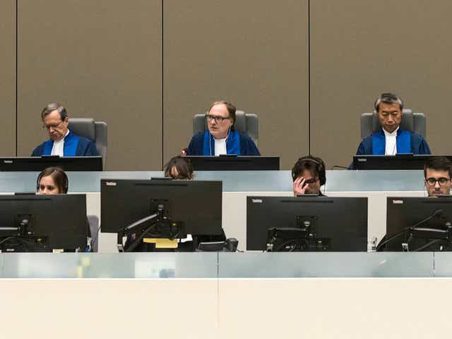 Presiding Judge Cuno Tarfusser of Italy, centre, Judge Chang-ho Chung of Korea, right, and Judge Marc Perrin de Brichambautat of France at the ICC