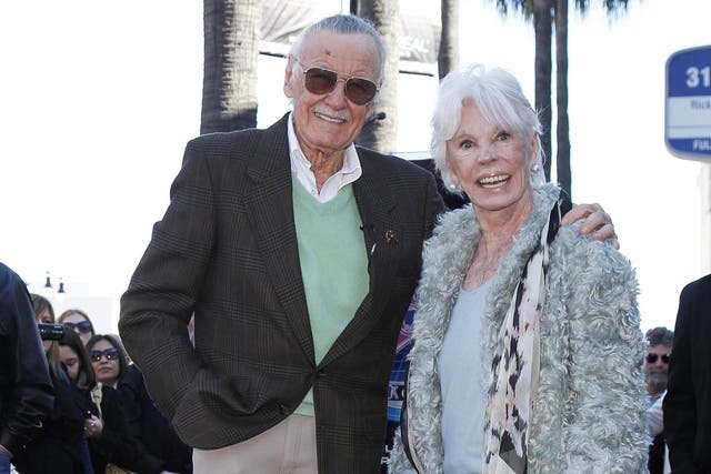 Comic book creator Stan Lee and his wife Joan pose on his star on the Hollywood Walk of Fame