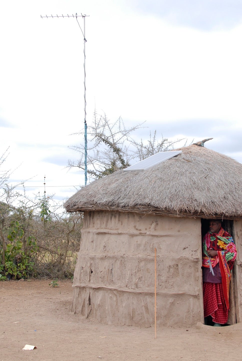 Solar panels on hut roofs are used to charge phones and power lights and radios