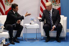 Trump says Mexico will pay for border wall after meeting with Nieto