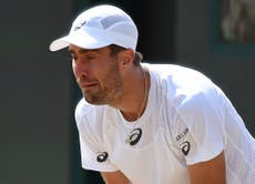 Johnson breaks down in tears at first Wimbledon since father's death