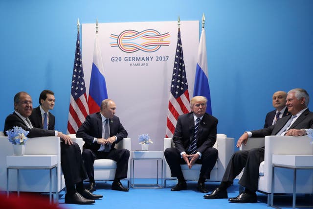 Trump and Putin met for the first time at the G20 summit, as the Russia investigation continues to dominate US headlines
