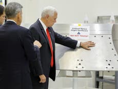 Mike Pence touches Nasa equipment despite clear 'do not touch' sign