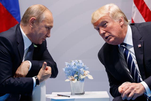 <p>Trump wrongly identified Putin as ‘the richest man in the world by a multiple’ (AP)</p>