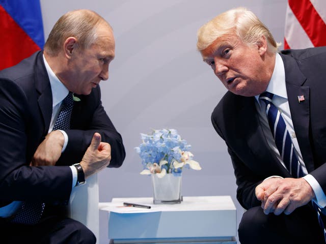 <p>Trump wrongly identified Putin as ‘the richest man in the world by a multiple’ (AP)</p>