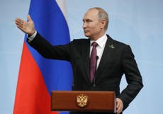 Vladimir Putin says Donald Trump believed his hacking denials