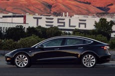 Elon Musk unveils Tesla's first mass-market car