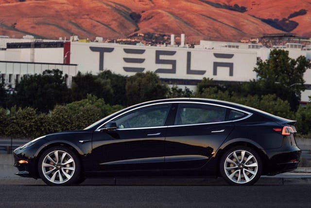 The first Model 3 to roll off Tesla's production line