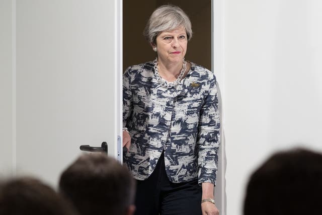 Theresa May said parties should work together to stamp out abuse of election candidates