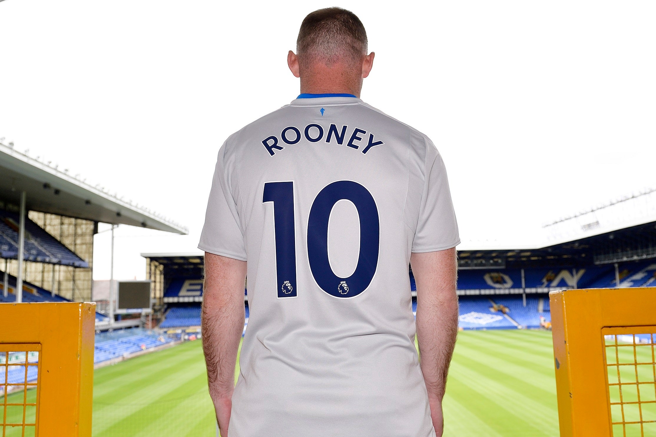 Wayne Rooney poses in Everton's new away shirt