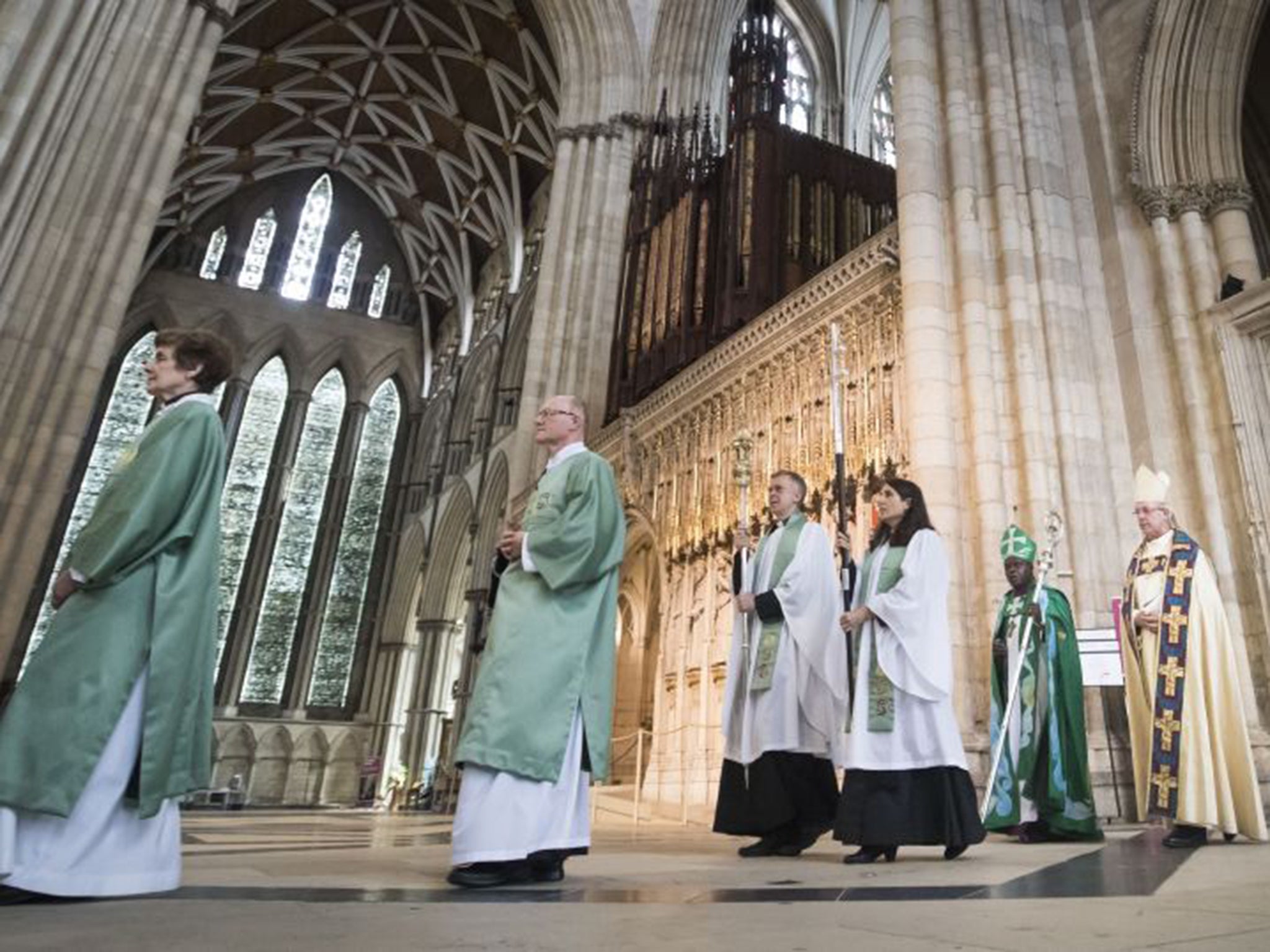 The Archbishop of York, Dr John Sentamu (left, back) and the Archbishop of Canterbury Justin Welby (right, back) at York Minster