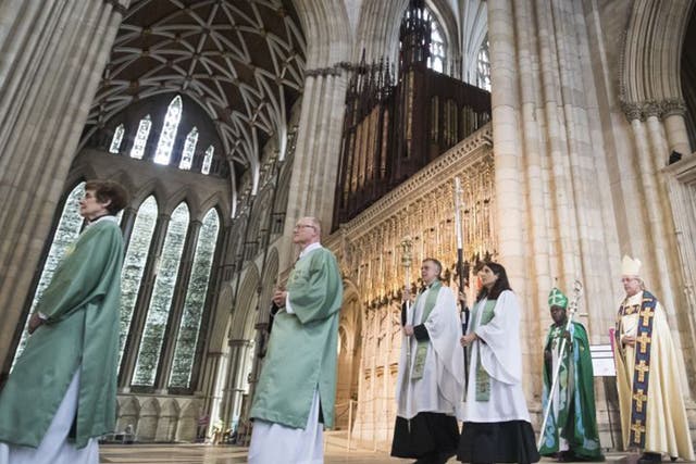 The Archbishop of York, Dr John Sentamu (left, back) and the Archbishop of Canterbury Justin Welby (right, back) during the procession ahead of the Eucharist at York Minster in York on Sunday
