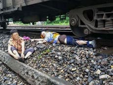 Train driver loses leg after saving elderly woman on railway tracks