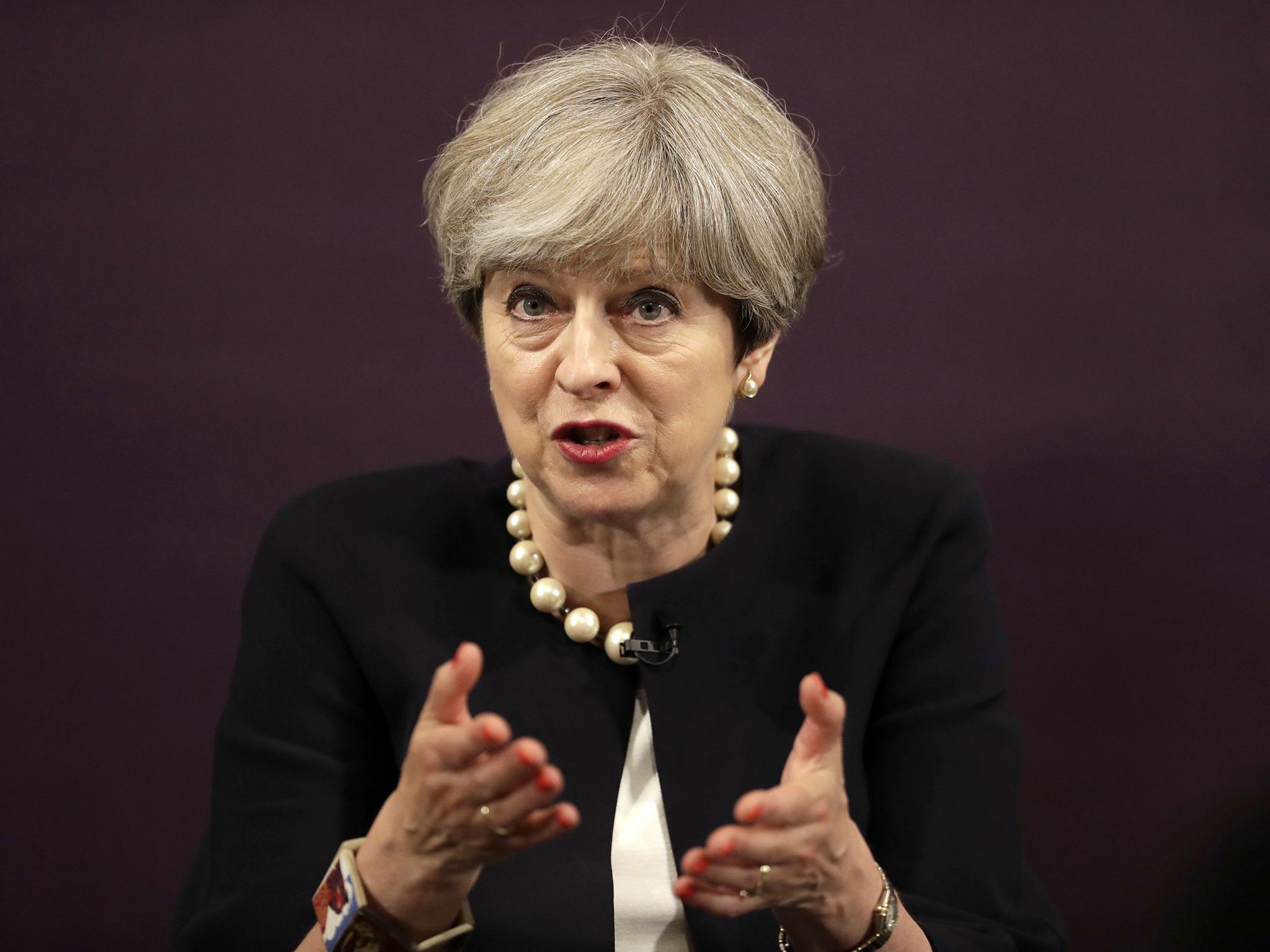 Theresa May urged Conservative MPs to end their 'backbiting' or pay the price