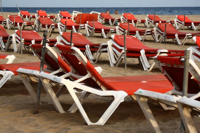 Sick beds? Sunloungers on the beach in Gran Canaria