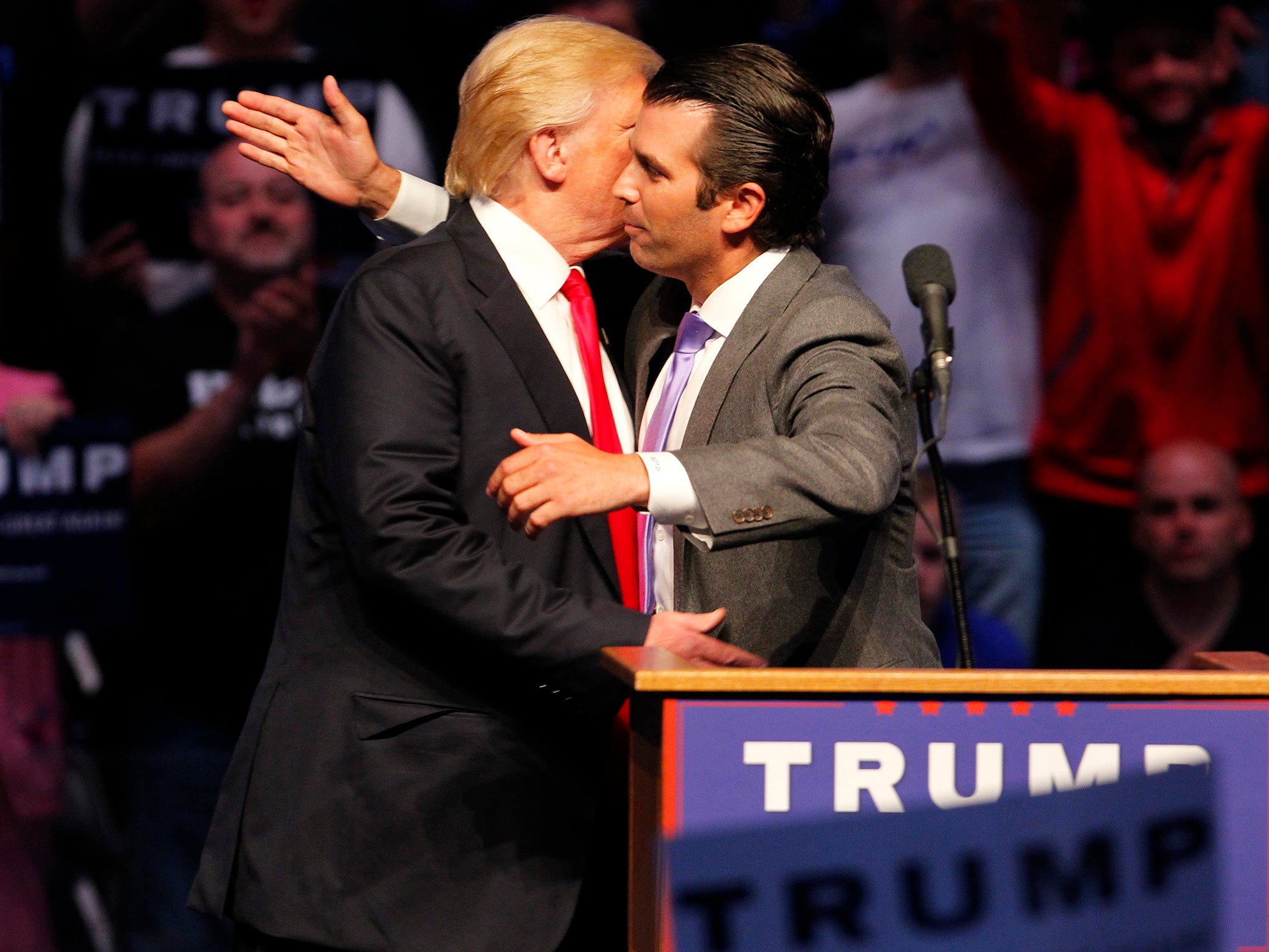 Donald Trump Jr. hugs his dad Donald Trump after addressing the crowd during a campaign rally at the Indiana Farmers Coliseum on April 27, 2016