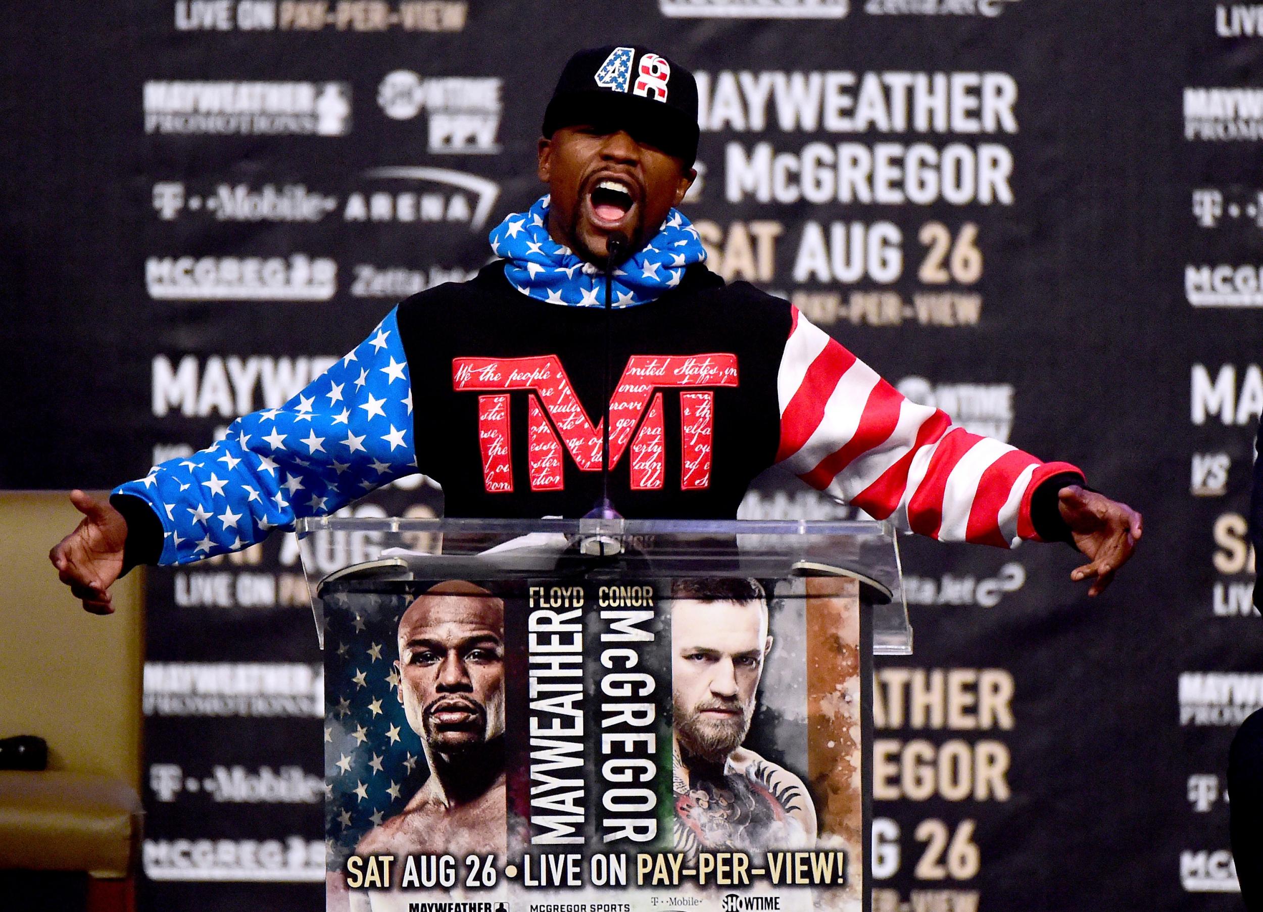 Mayweather cut a relaxed figure on stage
