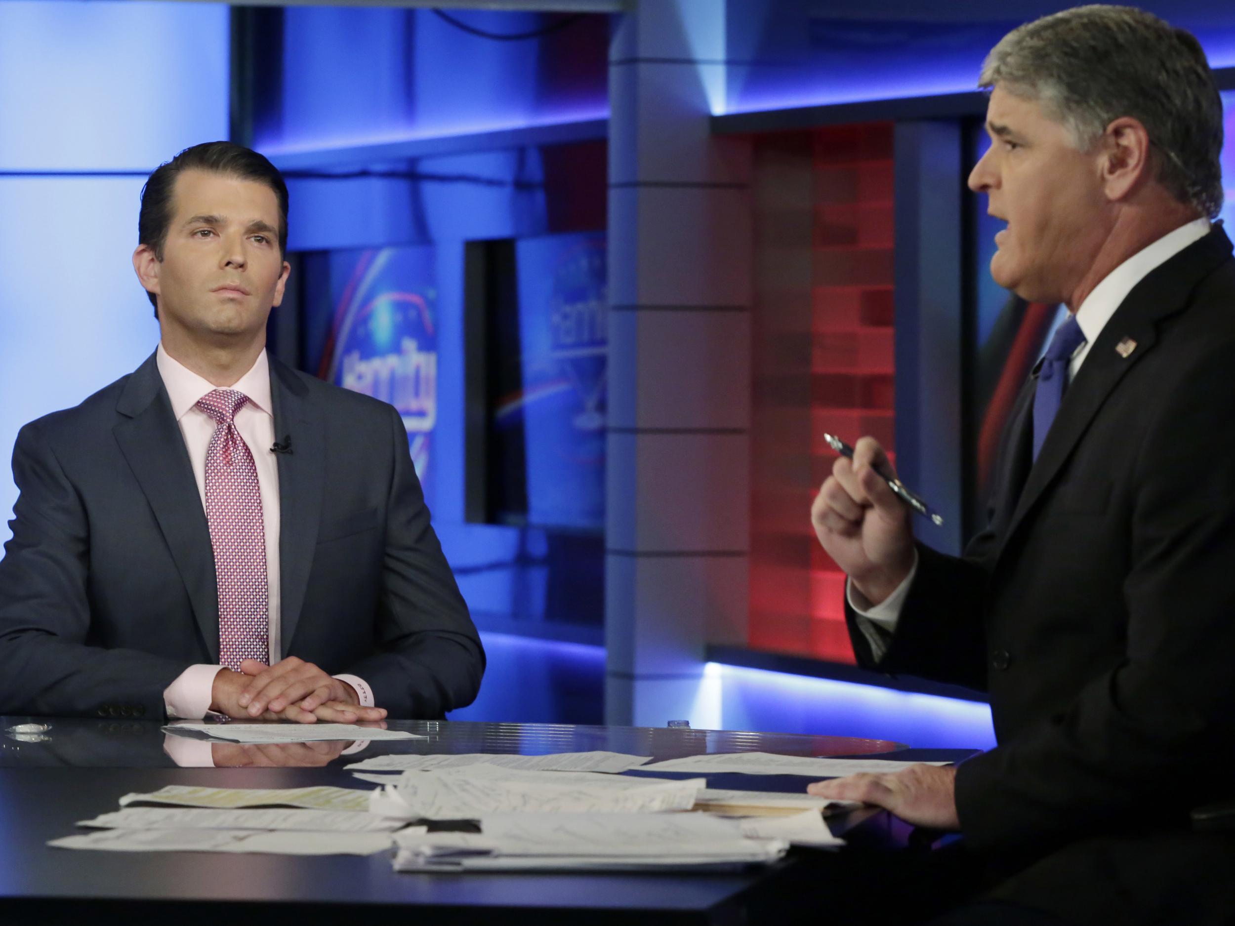 Donald Trump Jr is interviewed by host Sean Hannity on his Fox News Channel television programme in New York